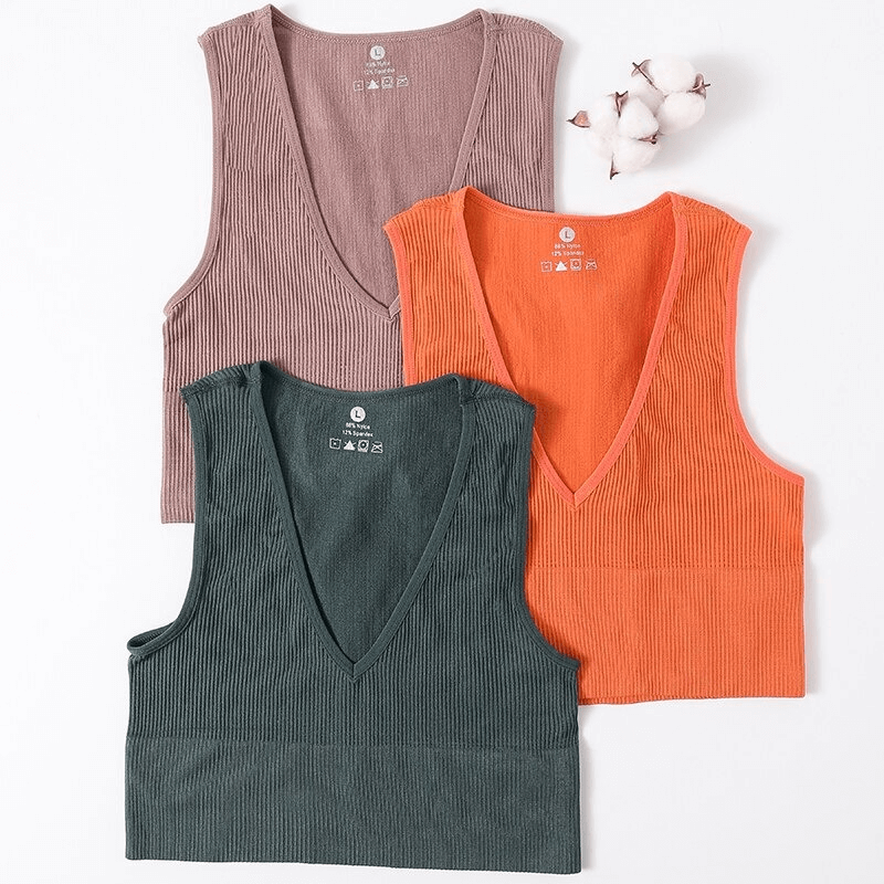Women's ribbed seamless tank tops in deep V-neck, available in earthy tones; perfect for yoga, sports, or casual wear.